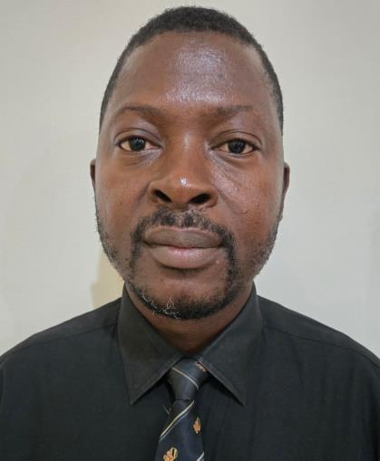 Portrait of Dr Raymond Onovo